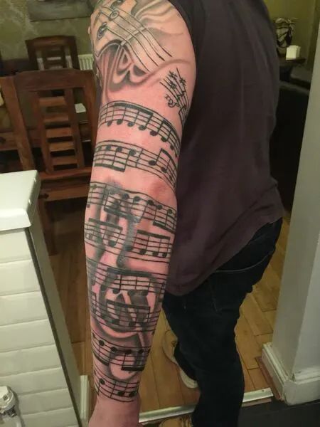 Melodic Ink: 25 Music-Inspired Tattoo Ideas for Men