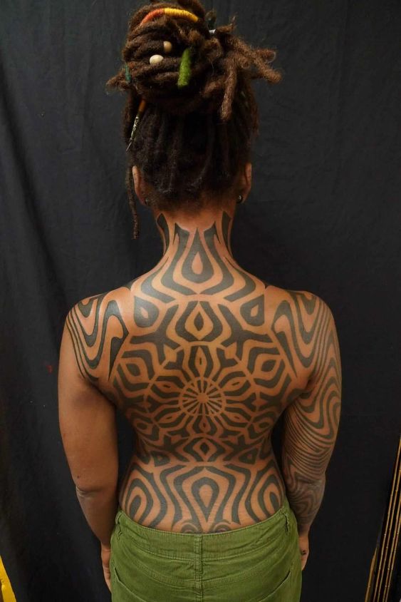 25 Colorful Tattoo Ideas for Dark Skin Tones Celebrating Vibrancy and