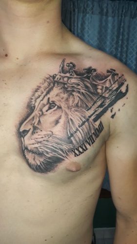 Roar with Confidence: 20 Lion Tattoo on Chest Design Ideas