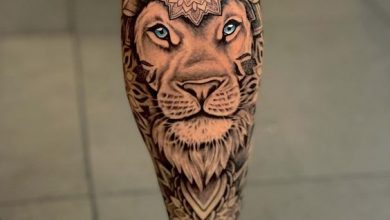 Leg Lion Tattoo: 22 Dynamic Designs for a Daring Look