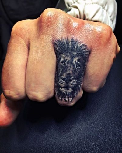 Fierce and Detailed: 19 Lion Tattoo on Finger Ideas
