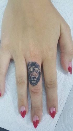 Fierce and Detailed: 19 Lion Tattoo on Finger Ideas