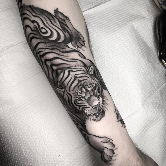 25 Striking Tiger Tattoo on Arm Ideas: Embrace the Roar of Power