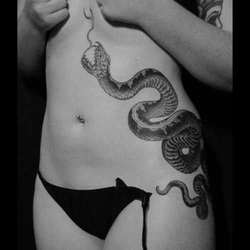 13 Snake Tattoo Ribs Ideas for Striking Art
