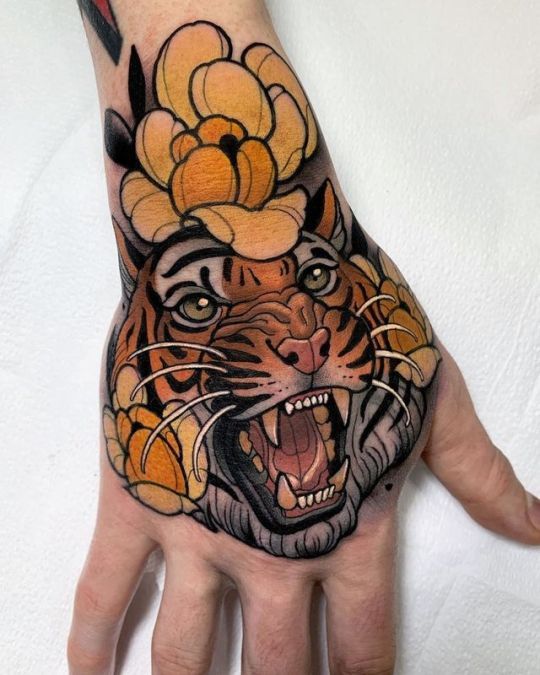 25 Tiger Tattoo on Hand Ideas - Welcome to Fashion Maverick! Discover ...