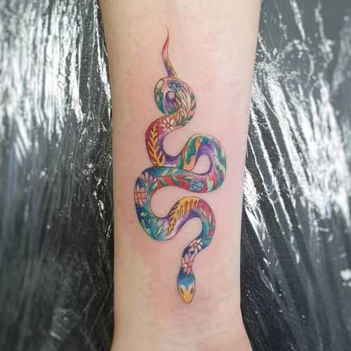 29 Mesmerizing Snake Tattoo Design Ideas