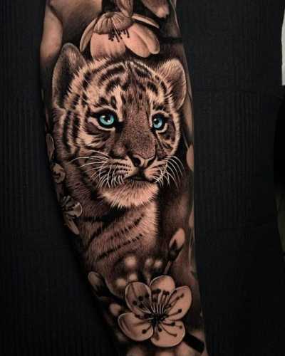 25 Tiger Tattoo on Arm Ideas