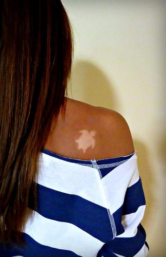 15 Creative Tan Tattoo Ideas for 2025: Embrace the Sun with Stylish Skin Art