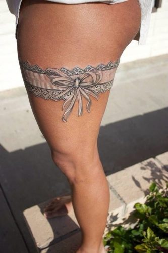 Unveil 2025&#8217;s Top 15 Thigh Cuff Tattoo Trends: From Polynesian Patterns to Cosmic Bands