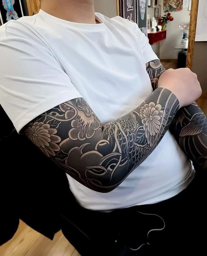 Discover Bold Blackout Tattoo Ideas 2025: Full Sleeve, Geometric, Abstract, with White Ink
