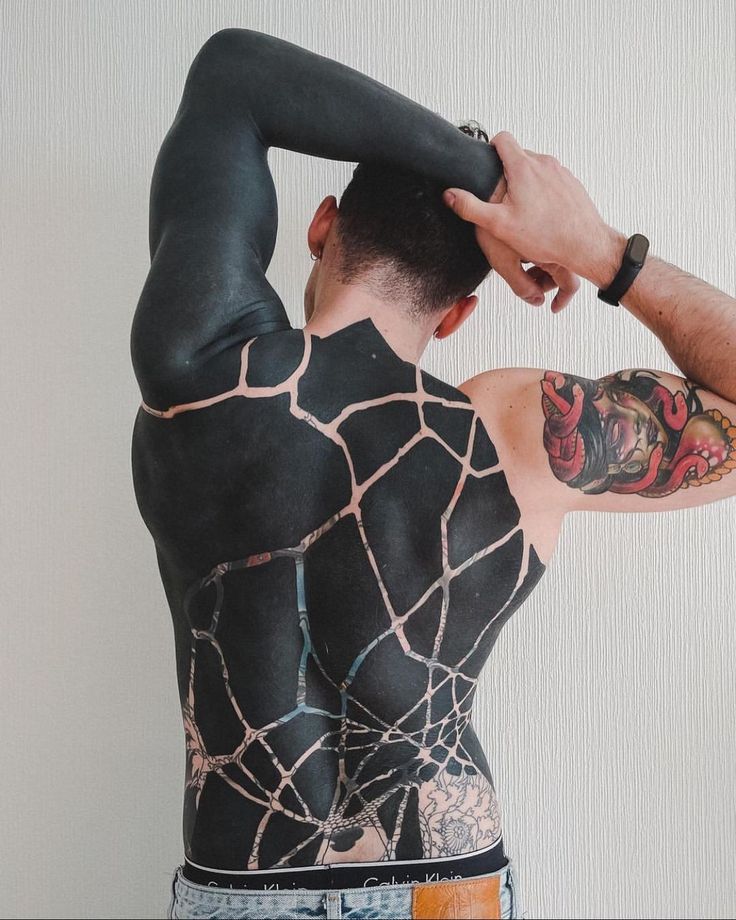 Discover Bold Blackout Tattoo Ideas 2025: Full Sleeve, Geometric, Abstract, with White Ink