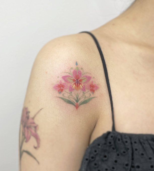 26 Orchid Tattoo Ideas 2025 for Minimalist, Colour, and Fine Line Designs