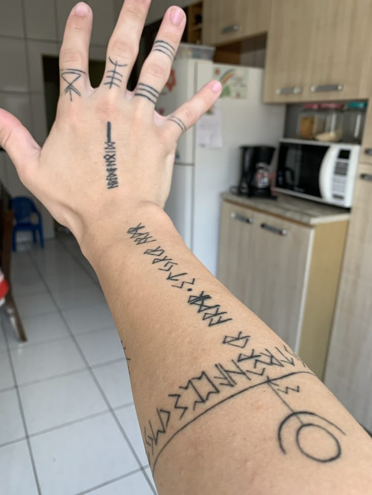 25 Viking Tattoo Ideas 2025 with Norse Mythology Symbols, Sleeve and Chest Designs