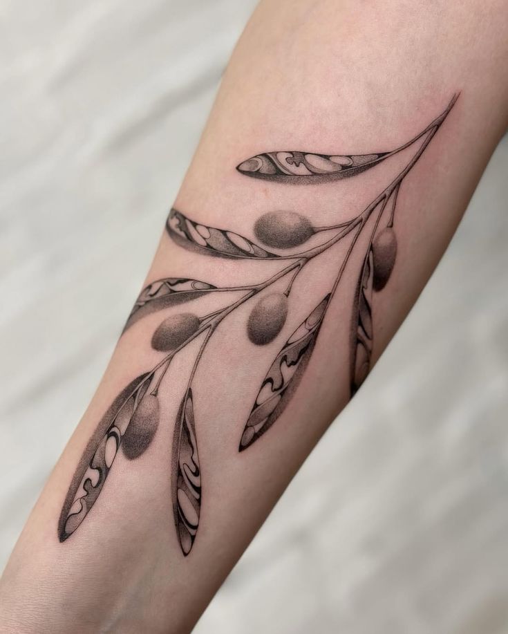 26 Olive Branch Tattoo Ideas 2025: Fine Line, Arm Wrap, Minimal, American Traditional Designs