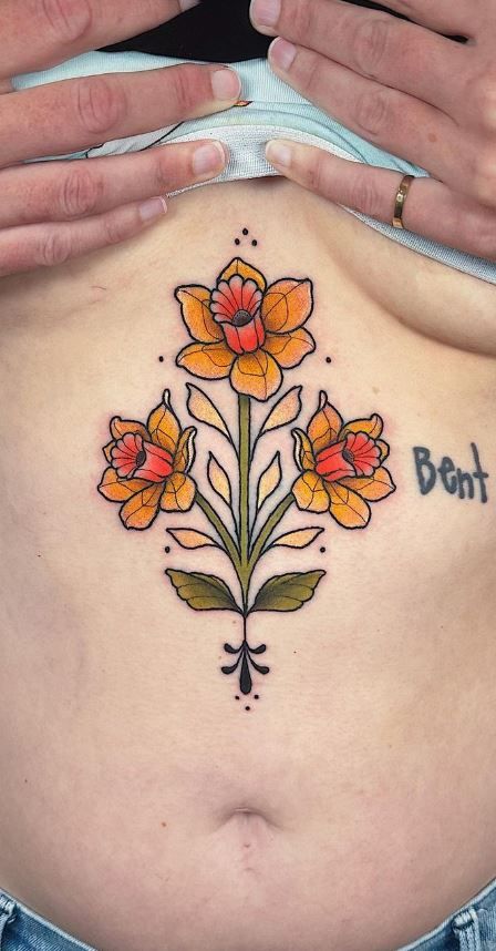 30 Daffodil Tattoo Ideas 2025: Fine Line, Traditional with Name, Birth Flower &#038; Neotraditional Design