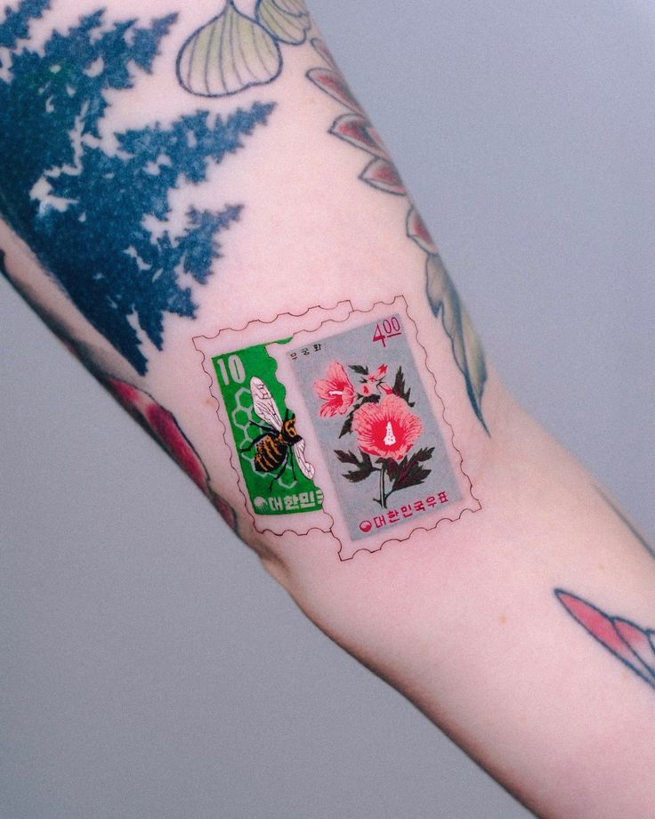 30 Unique Stamp Tattoo Ideas 2025 with Travel, Floral, Vintage, Fine Line, and Matching Postage Designs