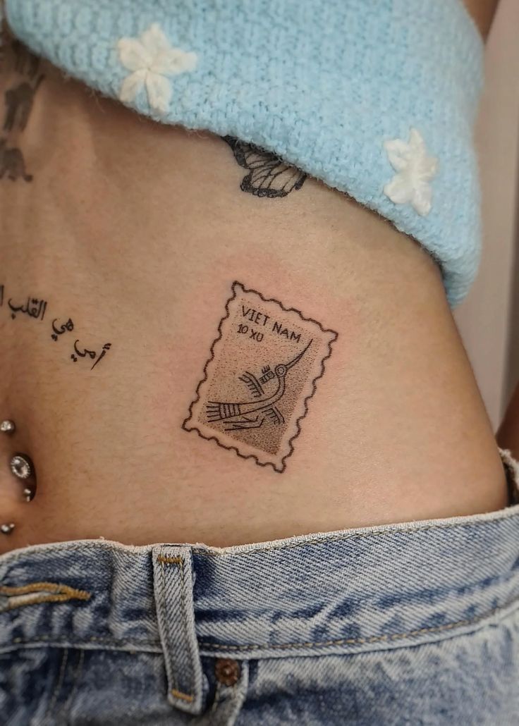 30 Unique Stamp Tattoo Ideas 2025 with Travel, Floral, Vintage, Fine Line, and Matching Postage Designs