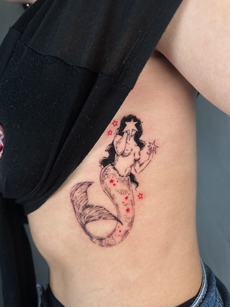27 Mermaid Tattoo Ideas 2025 With Minimalist, Traditional, Afro, Siren, and Barbie-Inspired Designs