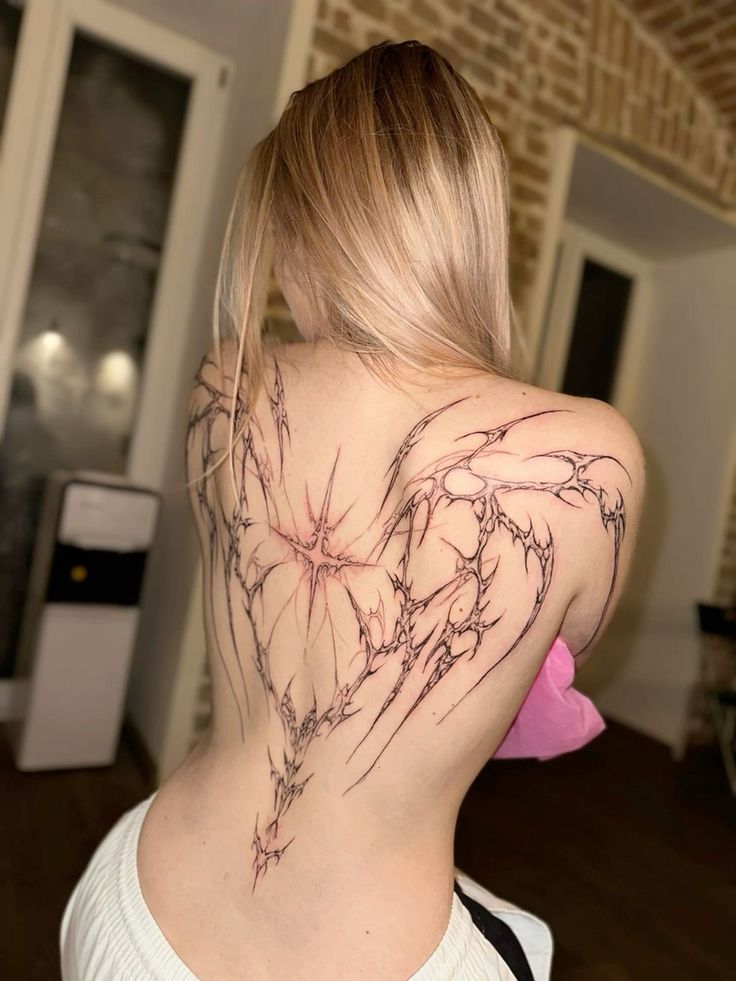 Wings Tattoo 28 Ideas: Stunning Angel, Phoenix, Icarus, Back, Arm &#038; Chest Designs 2025