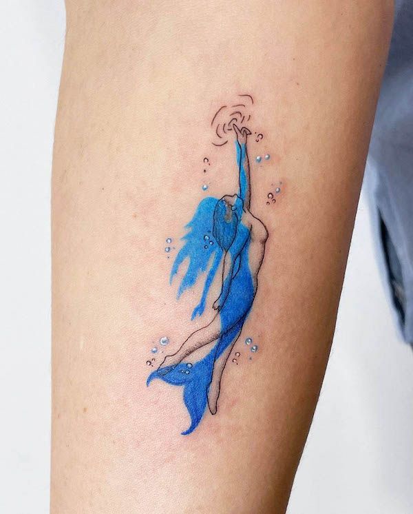 27 Mermaid Tattoo Ideas 2025 With Minimalist, Traditional, Afro, Siren, and Barbie-Inspired Designs