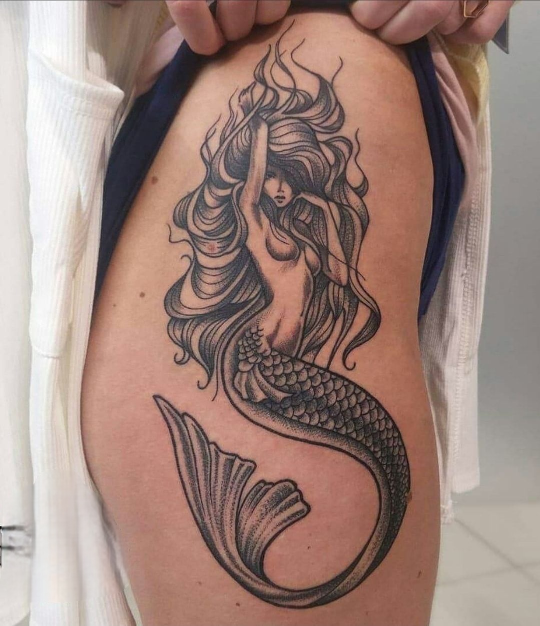 27 Mermaid Tattoo Ideas 2025 With Minimalist, Traditional, Afro, Siren, and Barbie-Inspired Designs