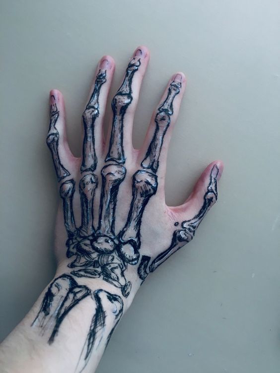 28 Skeleton Hand Tattoo Ideas 2025 Designs for Guy and Girl, Floral, Butterfly, Red ink and Full Body