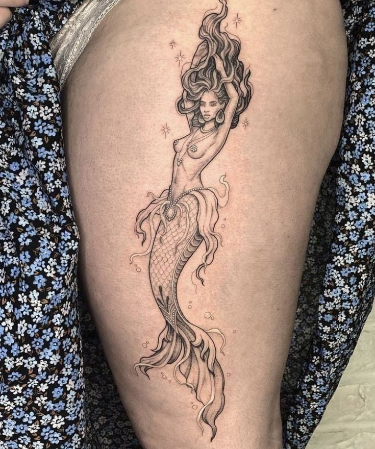27 Mermaid Tattoo Ideas 2025 With Minimalist, Traditional, Afro, Siren, and Barbie-Inspired Designs