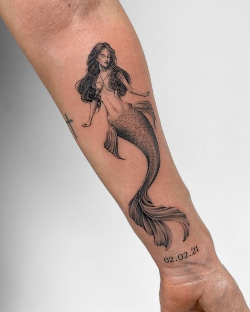 27 Mermaid Tattoo Ideas 2025 With Minimalist, Traditional, Afro, Siren, and Barbie-Inspired Designs