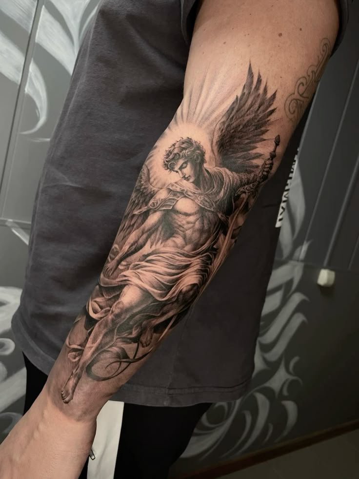 28 Archangel Michael Tattoo Designs for Men and Women – Realism, Sleeve, and Geometric Ideas