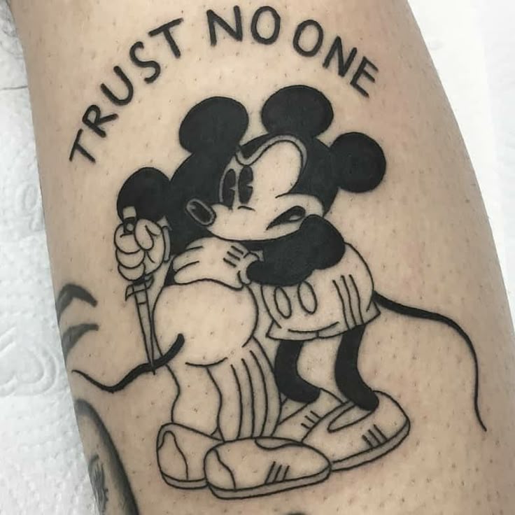 25 Trust No One Tattoo Designs with Lettering, Fonts, Ideas for Men and Women