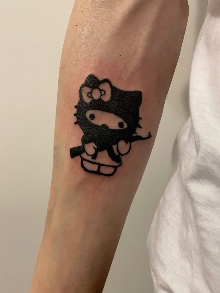 Hello Kitty Tattoo 29 Ideas 2025 for Women, Men &#038; Couples – Sleeve, Fine Line, Y2K, Cien Pies &#038; More