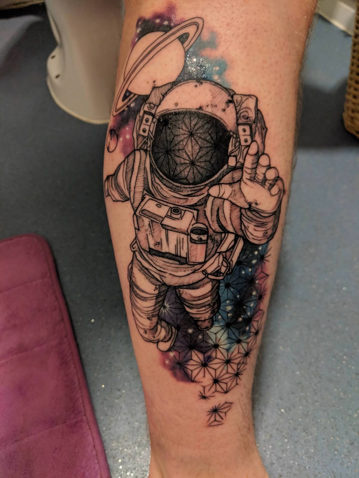 Astronaut Tattoo Ideas for Men and Women – Minimalist, Stencil Outline, and Cosmic Designs