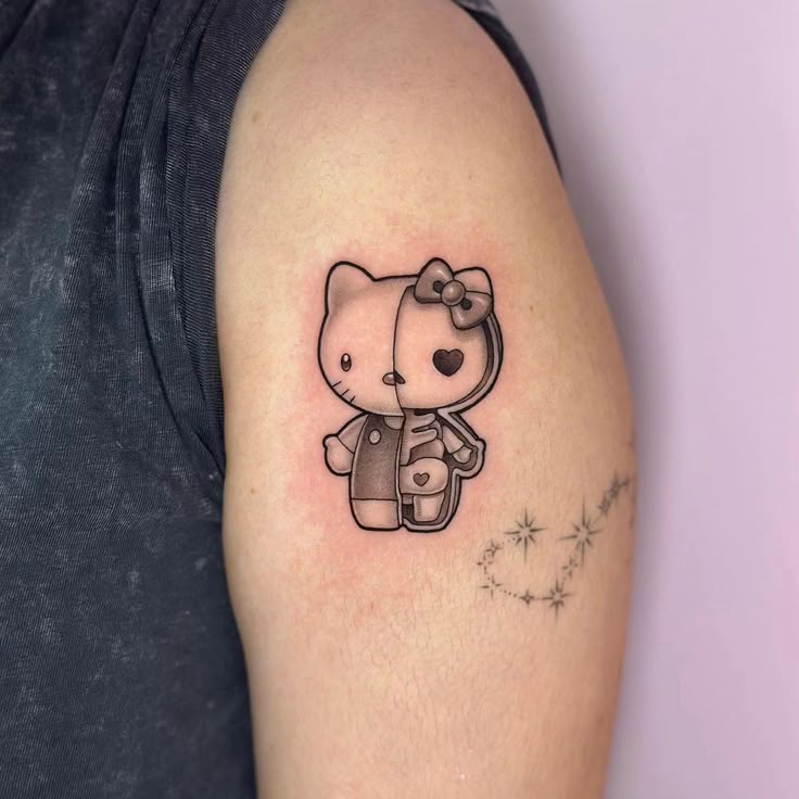 Hello Kitty Tattoo 29 Ideas 2025 for Women, Men &#038; Couples – Sleeve, Fine Line, Y2K, Cien Pies &#038; More