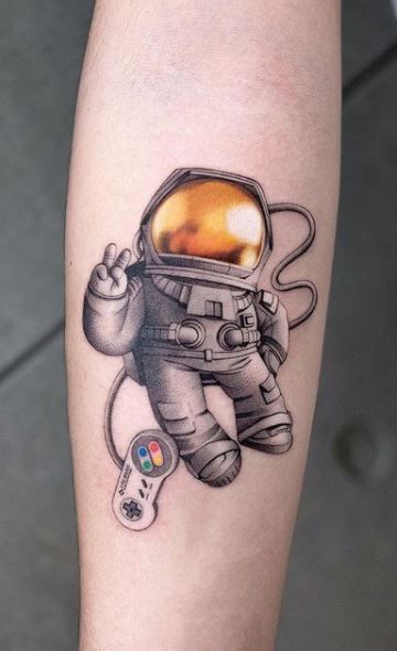 Astronaut Tattoo Ideas for Men and Women – Minimalist, Stencil Outline, and Cosmic Designs