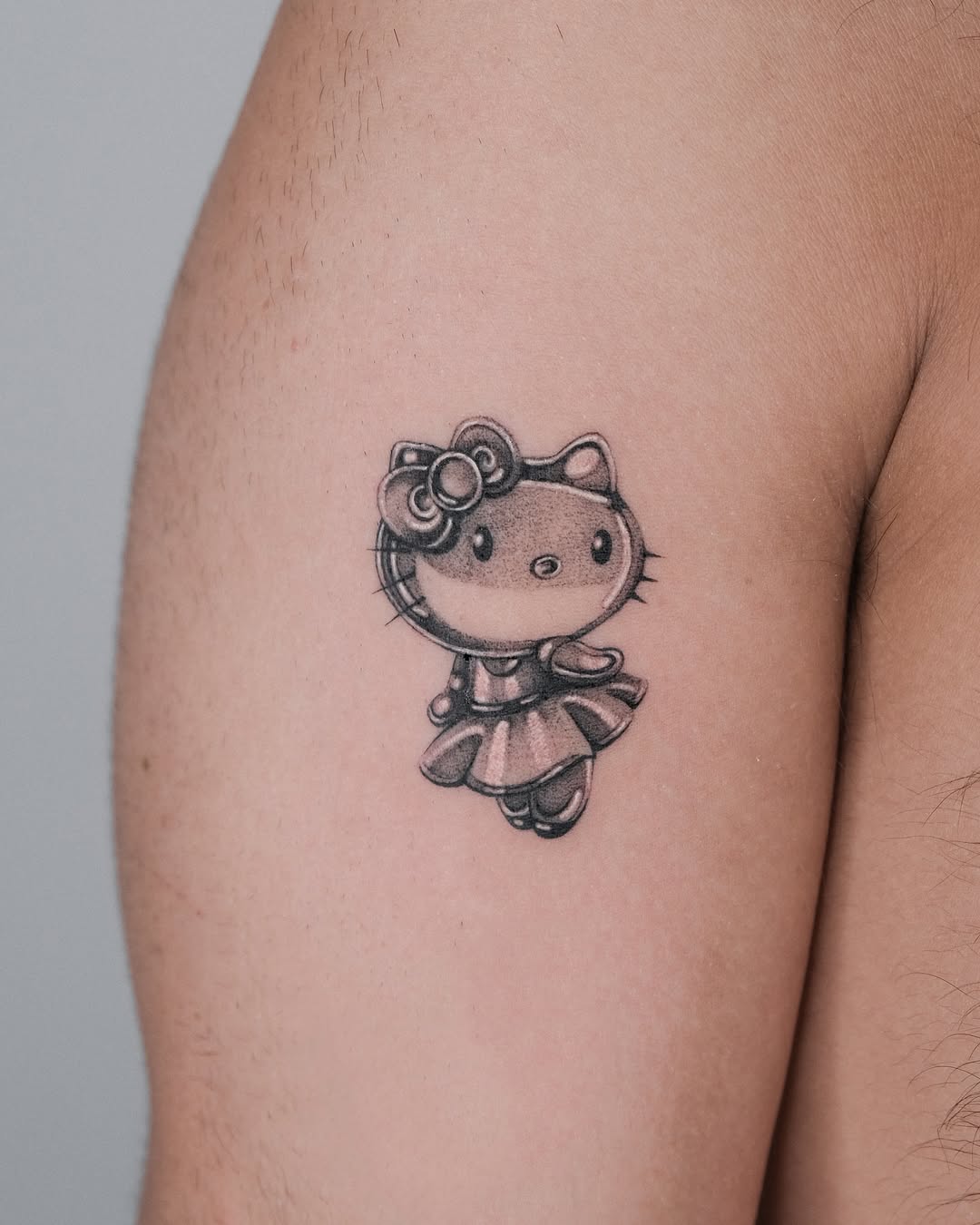 Hello Kitty Tattoo 29 Ideas 2025 for Women, Men &#038; Couples – Sleeve, Fine Line, Y2K, Cien Pies &#038; More
