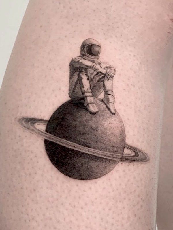 Astronaut Tattoo Ideas for Men and Women – Minimalist, Stencil Outline, and Cosmic Designs