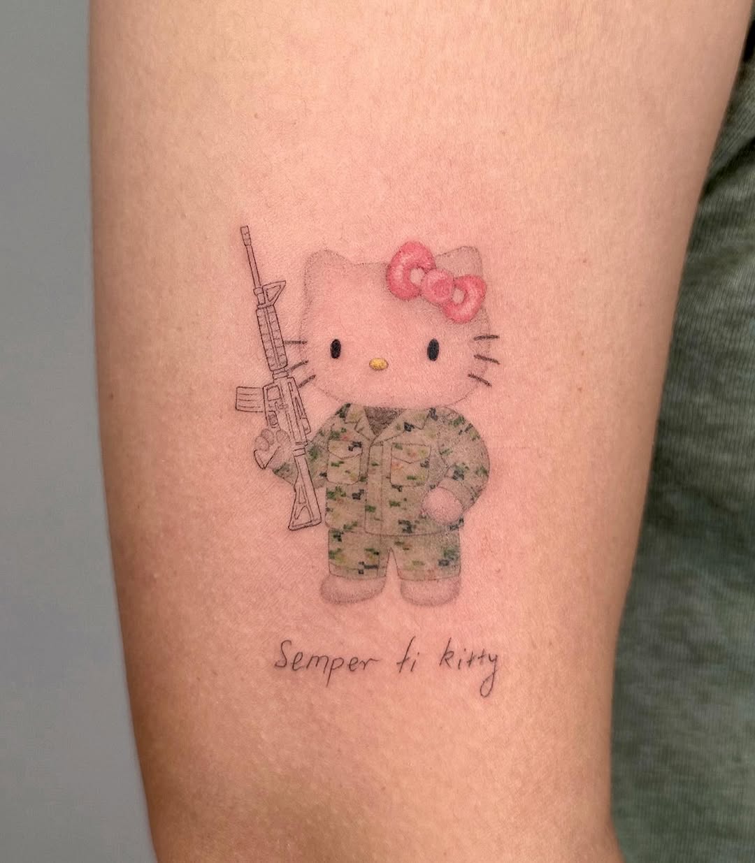 Hello Kitty Tattoo 29 Ideas 2025 for Women, Men &#038; Couples – Sleeve, Fine Line, Y2K, Cien Pies &#038; More