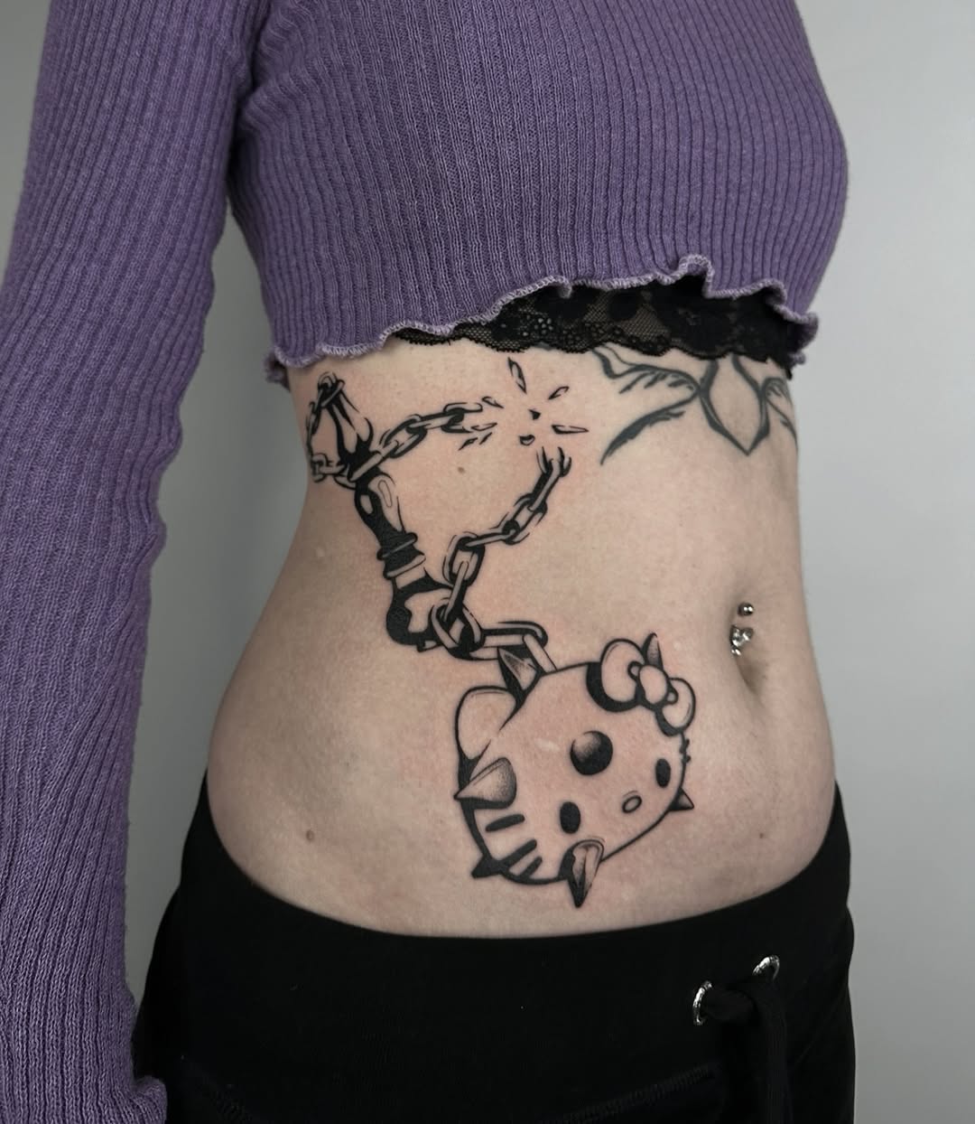 Hello Kitty Tattoo 29 Ideas 2025 for Women, Men &#038; Couples – Sleeve, Fine Line, Y2K, Cien Pies &#038; More