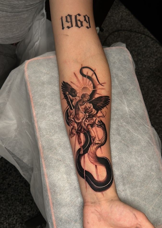 28 Archangel Michael Tattoo Designs for Men and Women – Realism, Sleeve, and Geometric Ideas