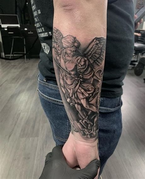29 Powerful St Michael Tattoo Designs for Men and Women – Forearm, Sleeve, Geometric, Traditional