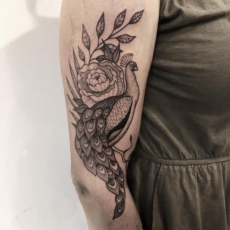 The Symbolic Splendor of Peacock Tattoos: Powerful Designs That Speak for Themselves