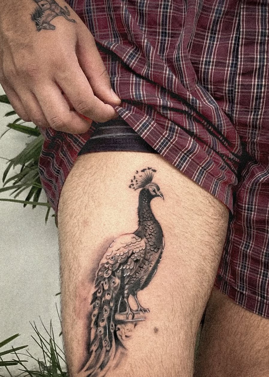 The Symbolic Splendor of Peacock Tattoos: Powerful Designs That Speak for Themselves