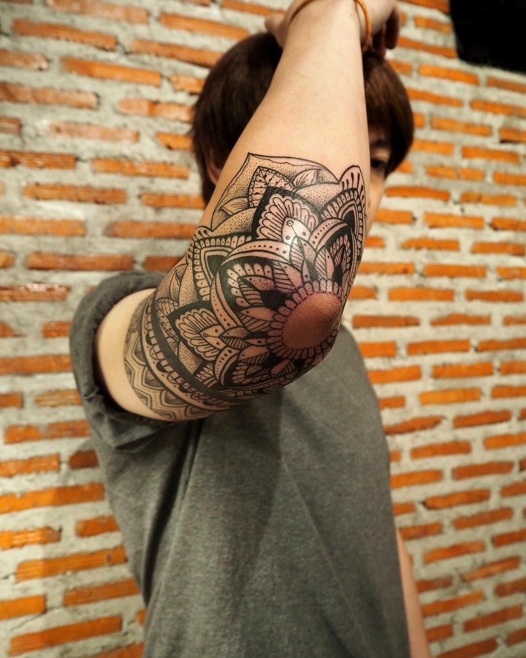 30 Elbow Tattoo Ideas: Designs That Move With You in 2026