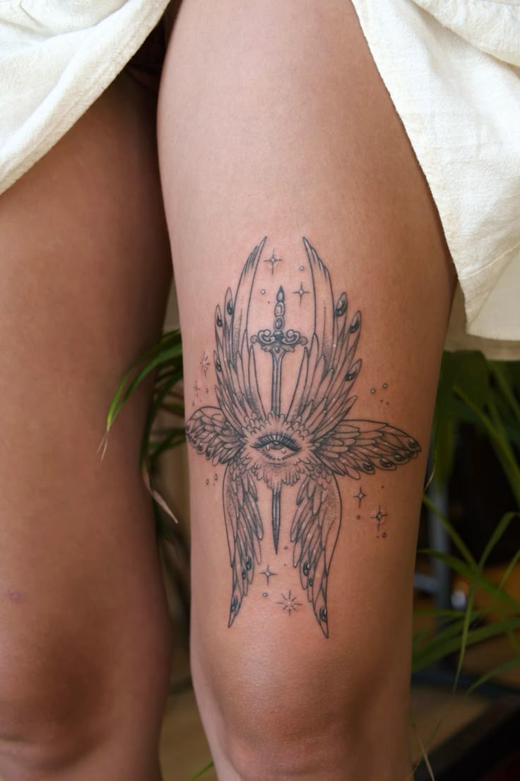 28 Seraphim Tattoo Ideas: Sacred Wings, Watchful Eyes, and Sharp Lines