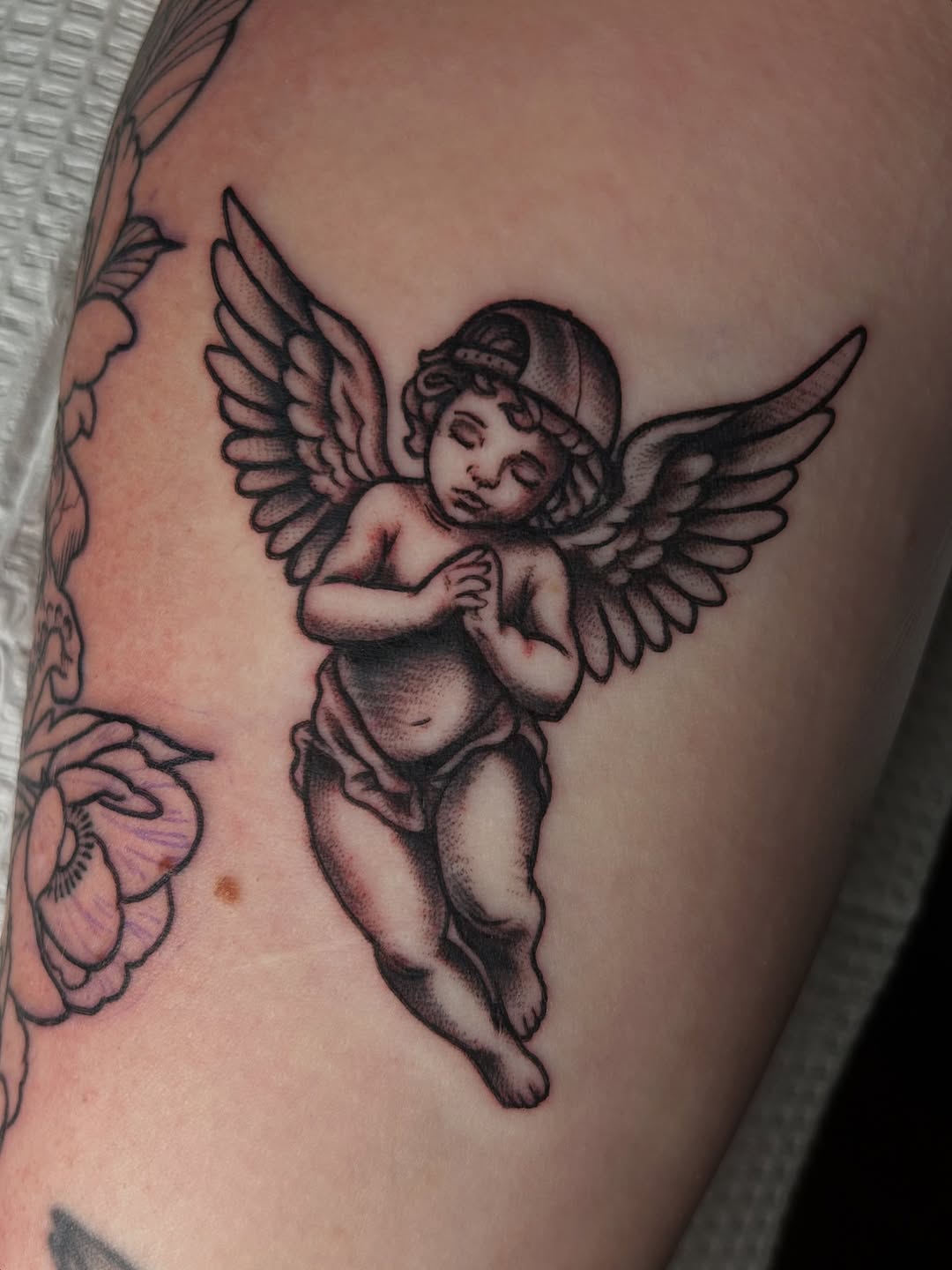 28 Cherub Tattoo Ideas: Styles From Classic to Subversive