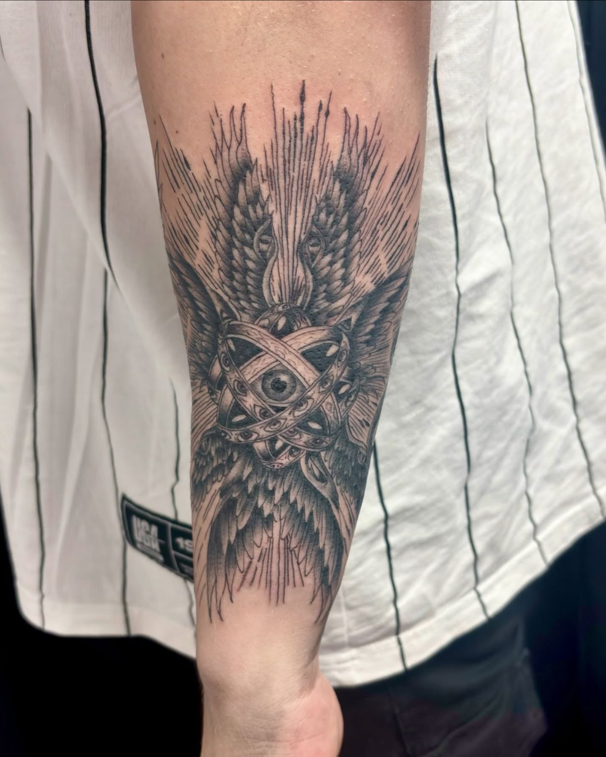 28 Seraphim Tattoo Ideas: Sacred Wings, Watchful Eyes, and Sharp Lines