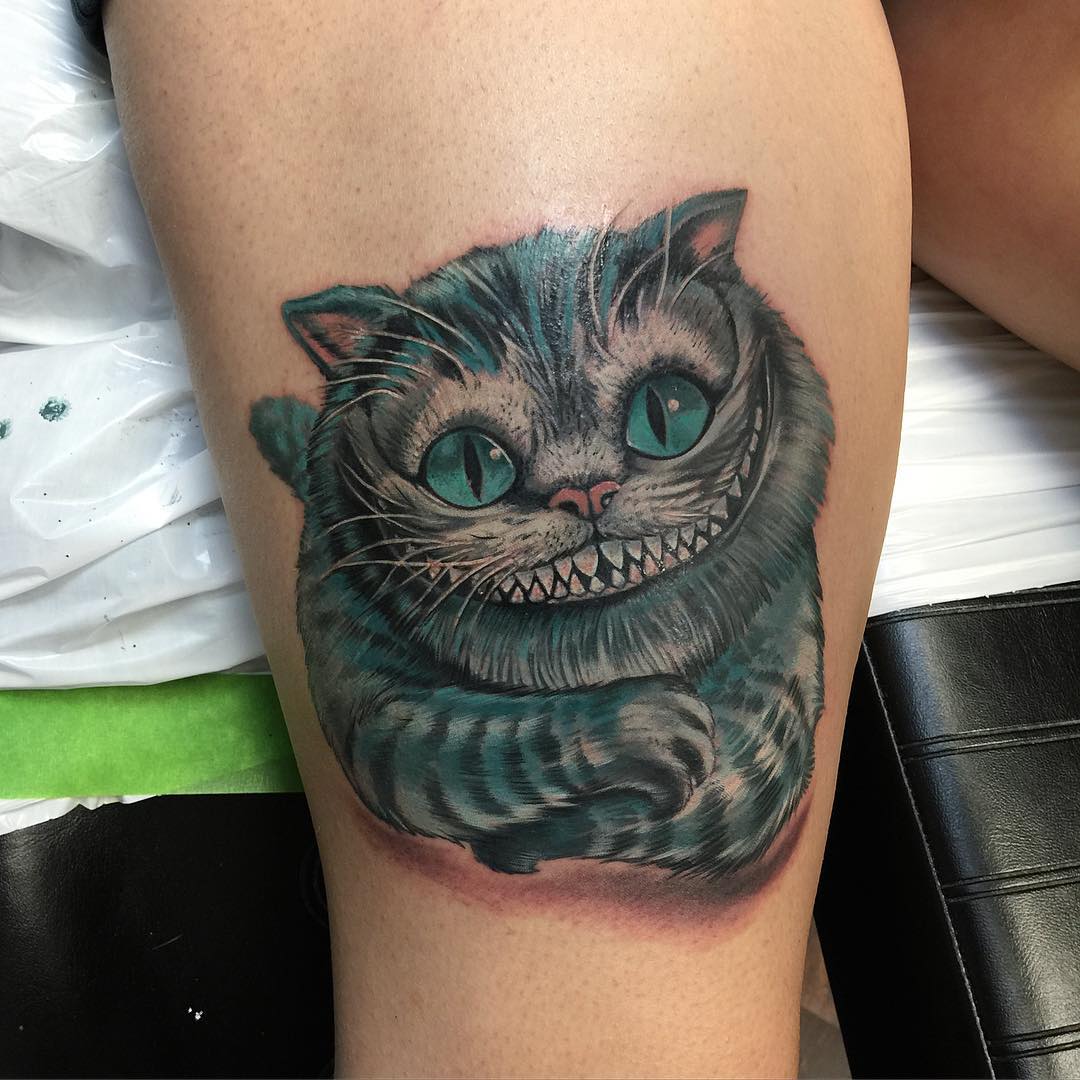 29 Cheshire Cat Tattoo Ideas: From Whimsical Grins to Dark Wonderland Symbolism