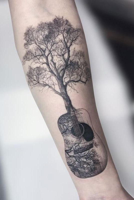31 Guitar Tattoo Ideas for Music Lovers: From Minimalist Designs to Bold Sleeve Art