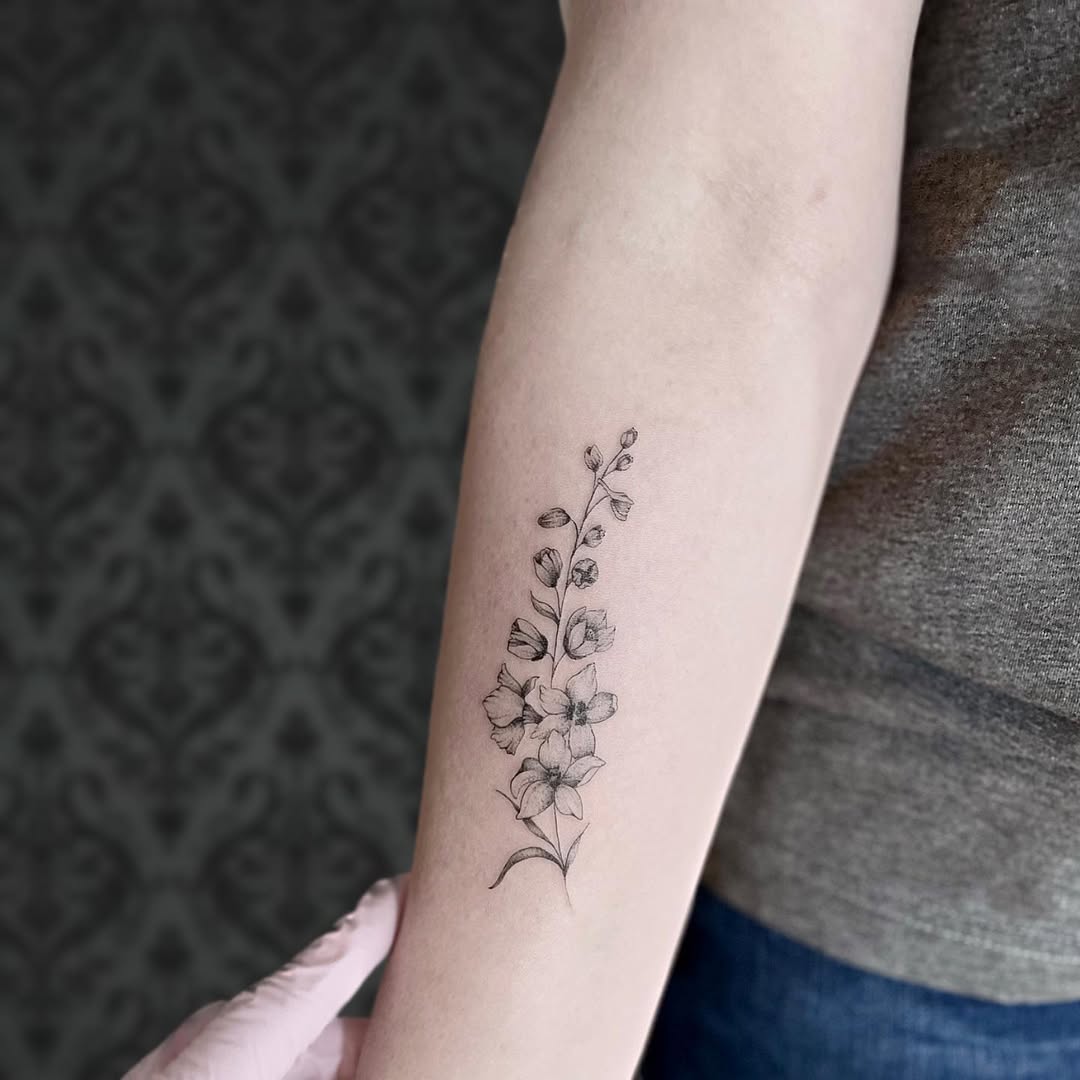 28 Larkspur Tattoo Ideas: Delicate July Blooms with Big Meaning