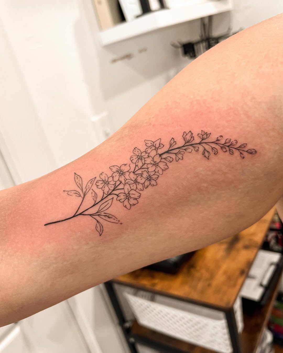28 Larkspur Tattoo Ideas: Delicate July Blooms with Big Meaning